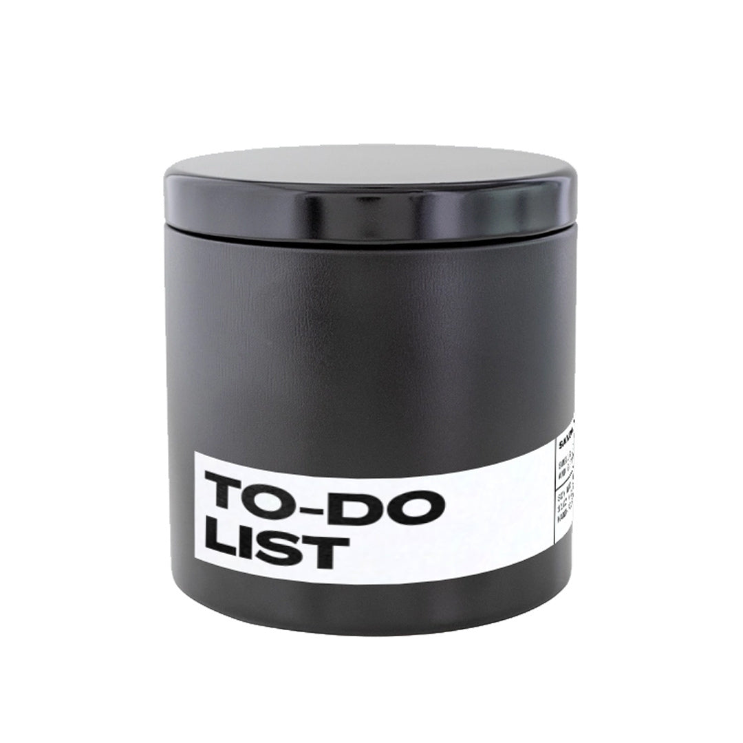 To-Do List Candle in black tin vessel.